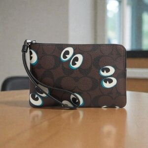 Coach Brown Clutch with Eye Motif